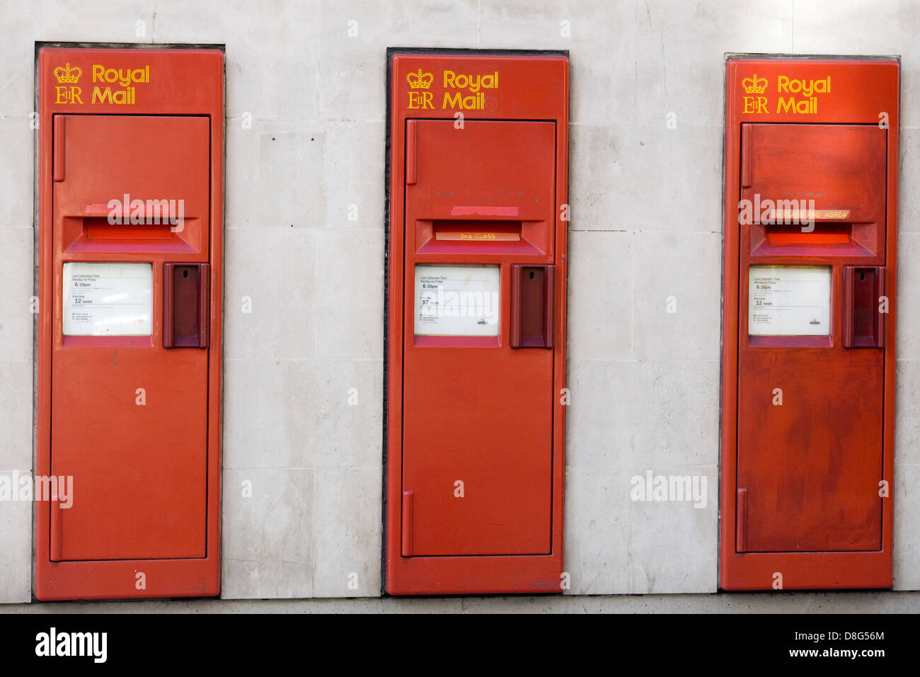 Three Red Royal mail boxes in Leicester Square London Stock Photo Alamy