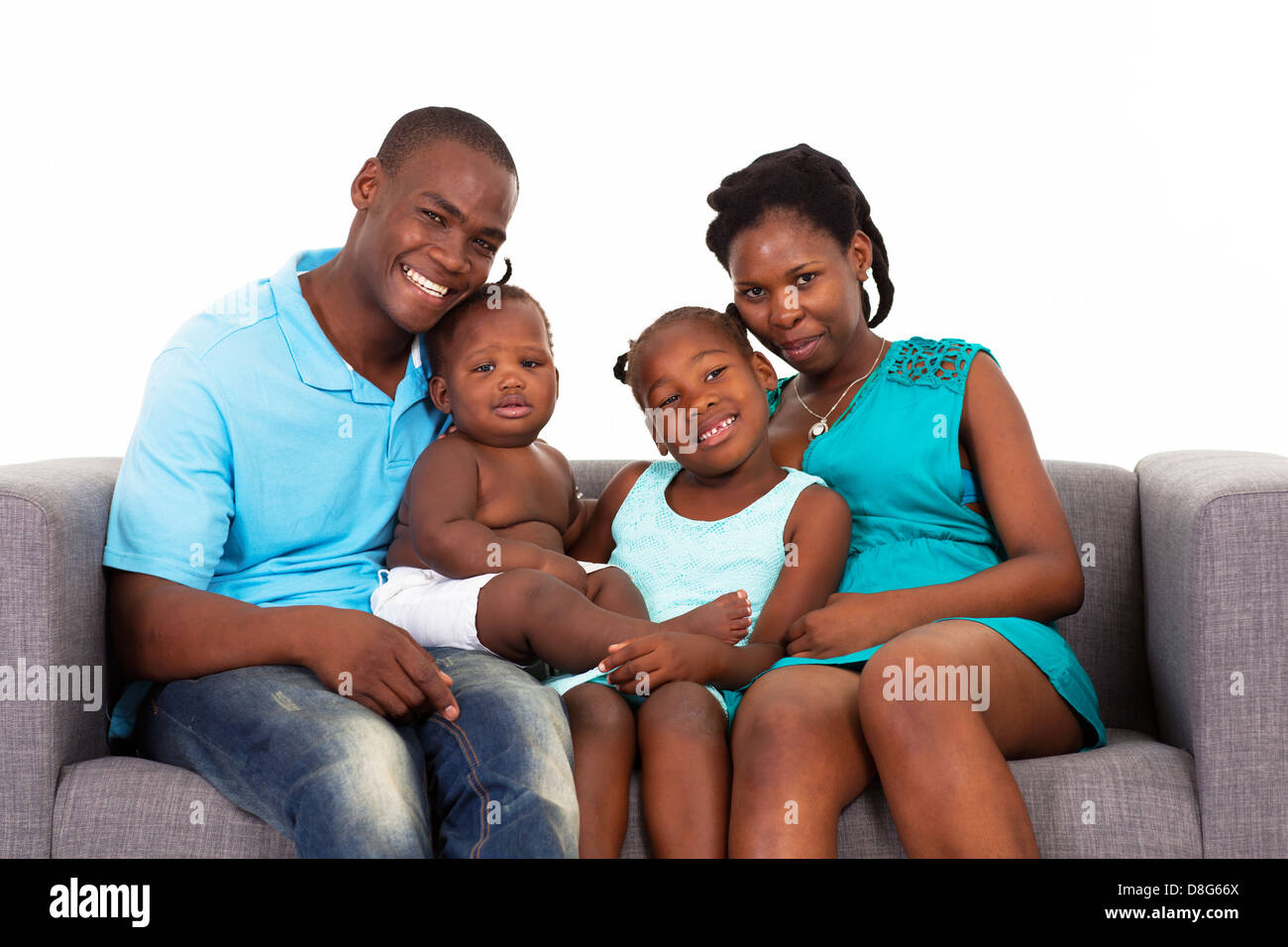 happy African American family sitting on sofa Stock Photo - Alamy