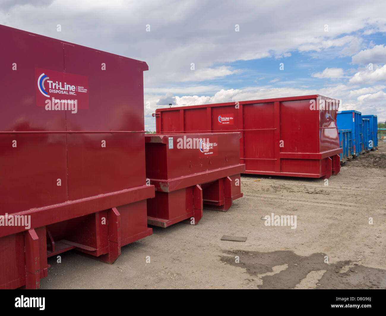 Trash bins outside construction site in Edmonton Stock Photo Alamy