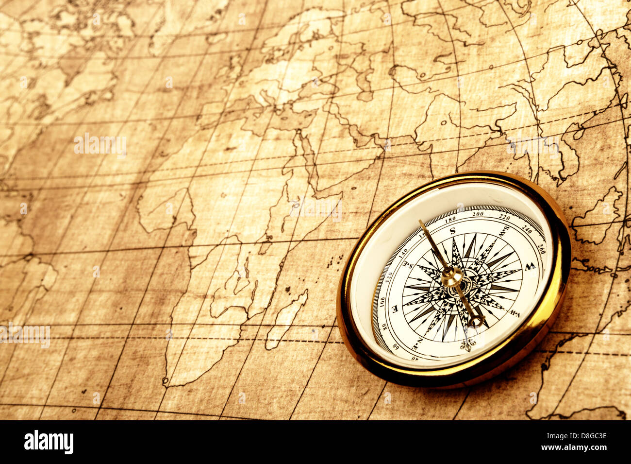 Compass on old map Stock Photo - Alamy