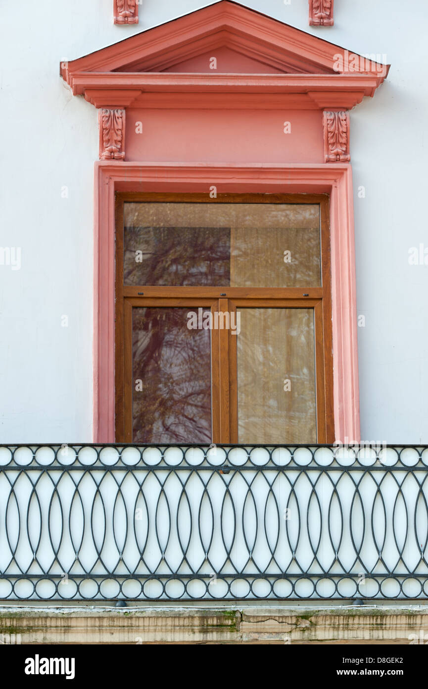 Facade of a building with a balcony Stock Photo - Alamy