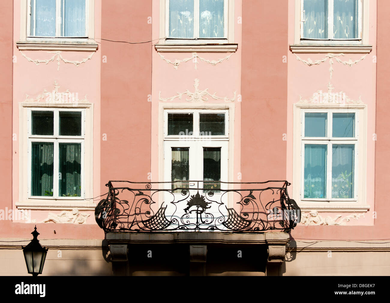 Facade of a building with a balcony Stock Photo - Alamy