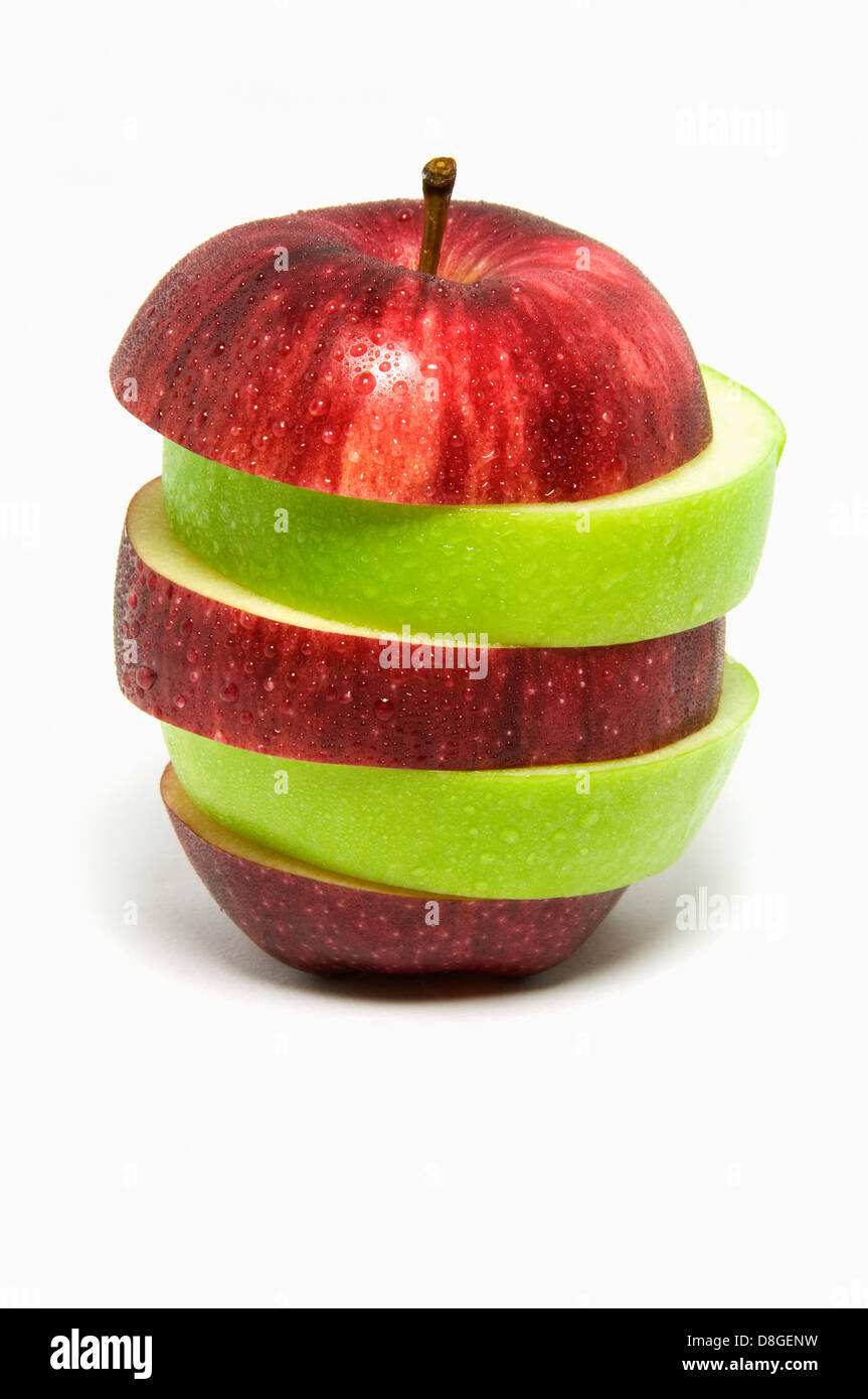 Red and Green Sliced Apple on White Background Stock Photo
