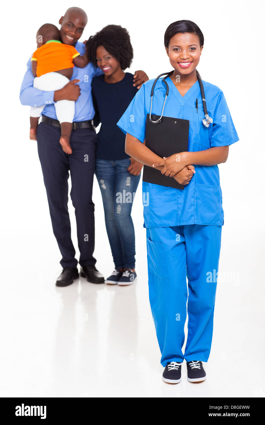 beautiful young black nurse with African family Stock Photo