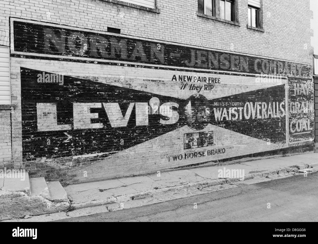 Old ad for the second ever JC Penny Store on the side of an old building in the historic mining town of Eureka, Utah. Stock Photo