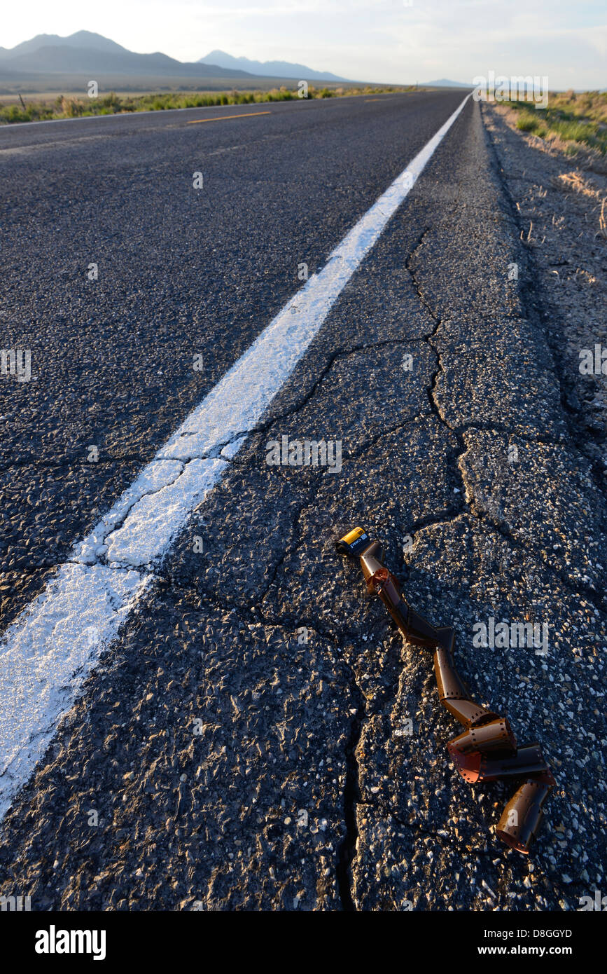 Discarded roll of film along the side of highway in the Great Basin region of Utah. Stock Photo