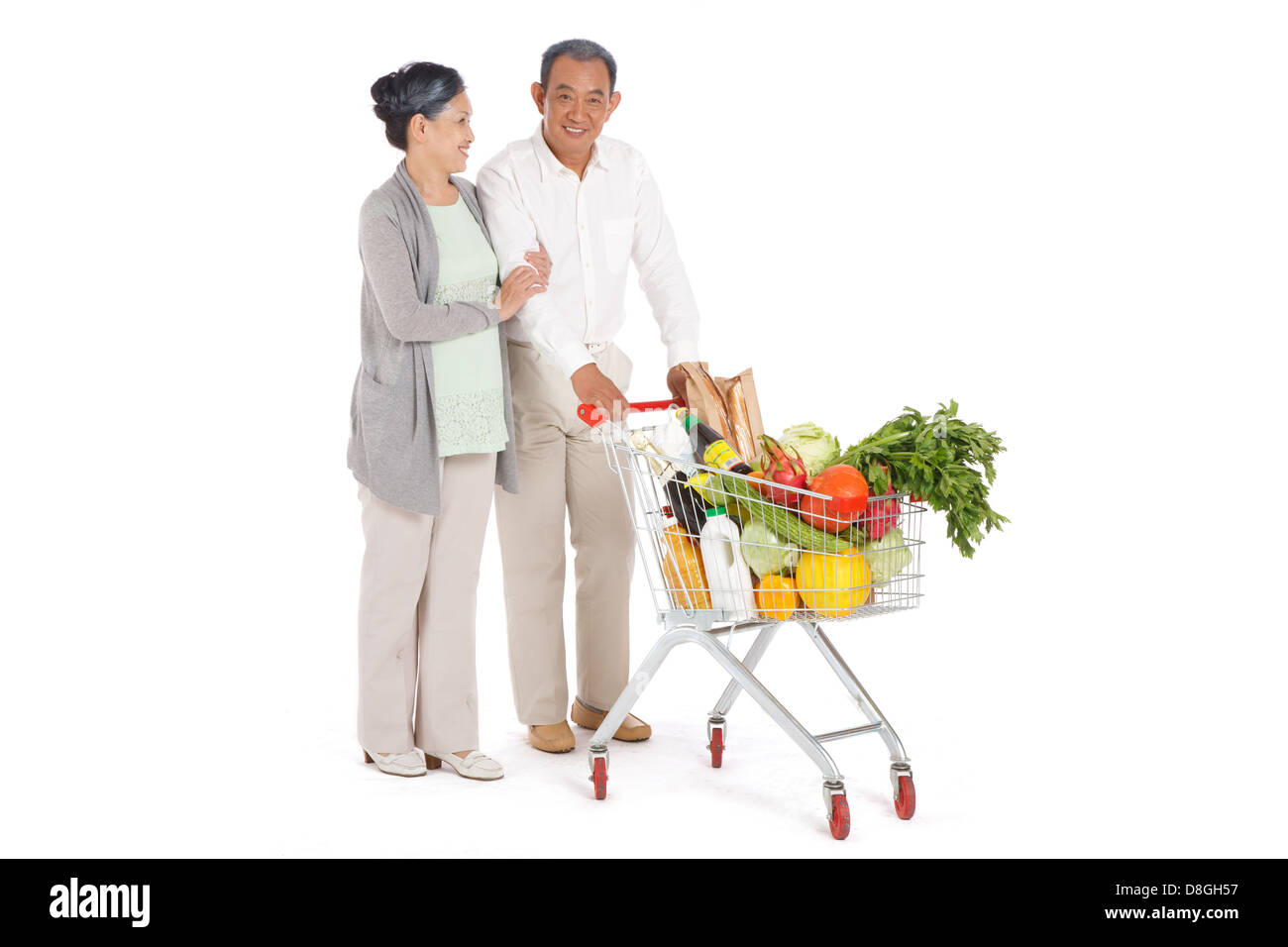 Old chinese woman pushing cart hi-res stock photography and images - Alamy