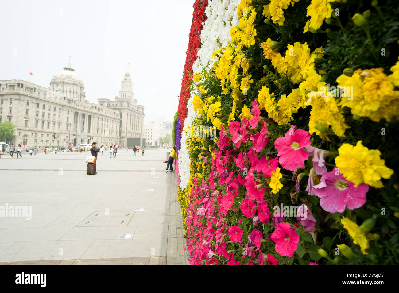 A view of the wall of flowers along The Bund in Shanghai, China Stock
