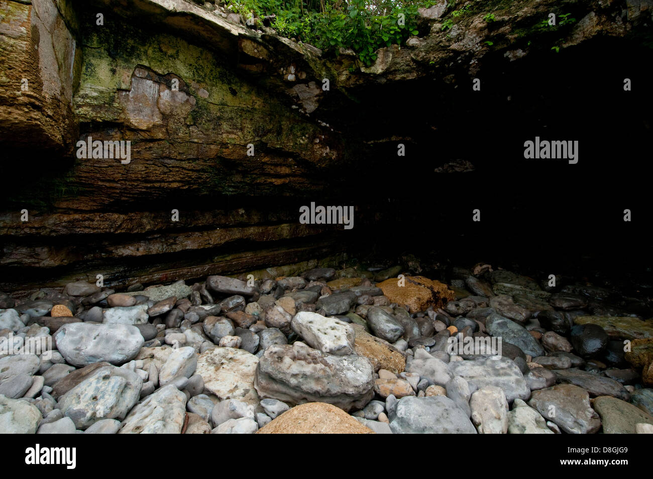 Cave carved in the rocks by sea water at Pacheca island Stock Photo