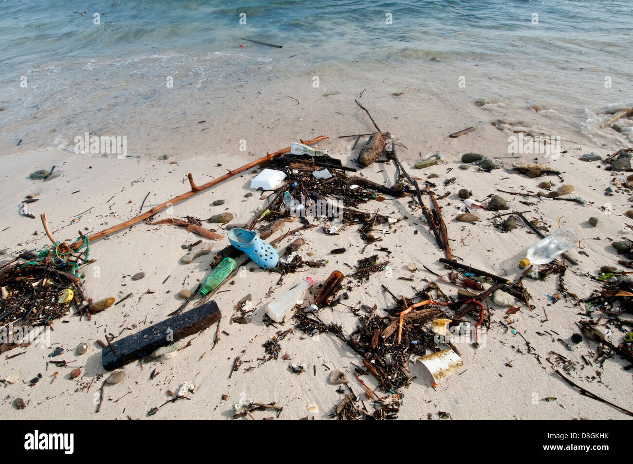 Garbage along the shore at Isla Pacheca Stock Photo