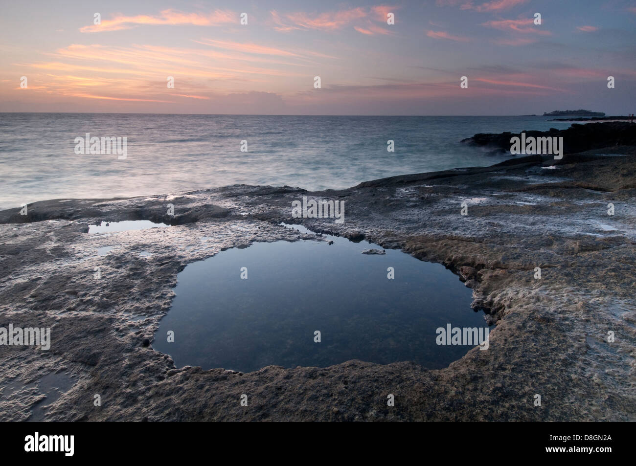 Water pool formed at low tide in Isla Pacheca shore Stock Photo
