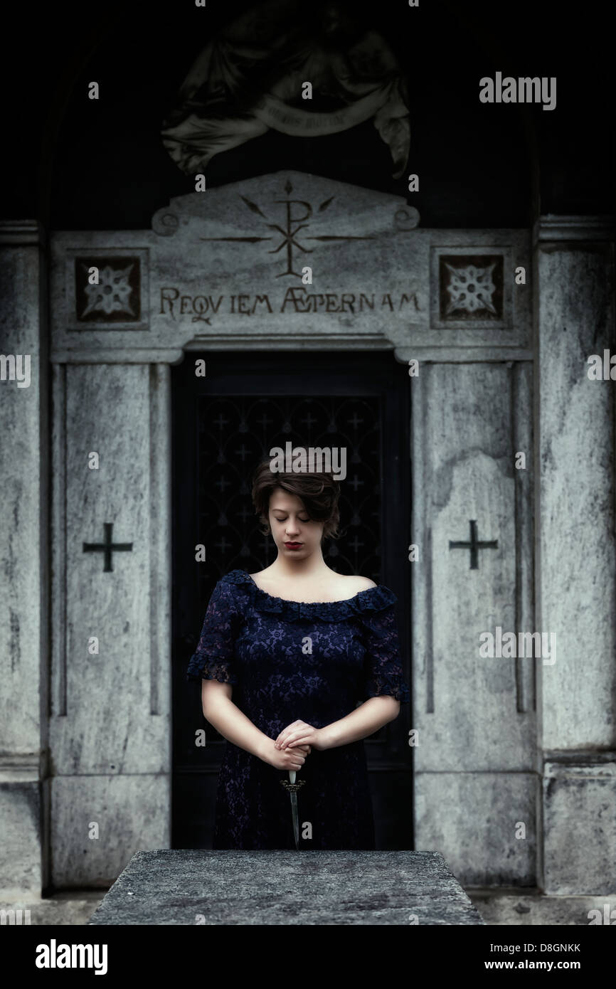 a woman in a dark dress is standing at an altar in front of a church ...