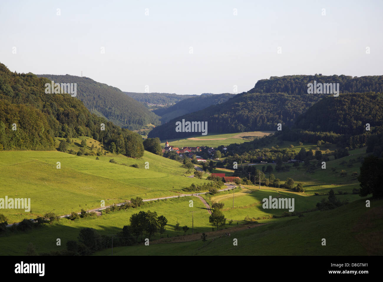 Germany, Baden-Württemberg, Swabian Alb (mountains), epee field, village, street, point of view Stock Photo