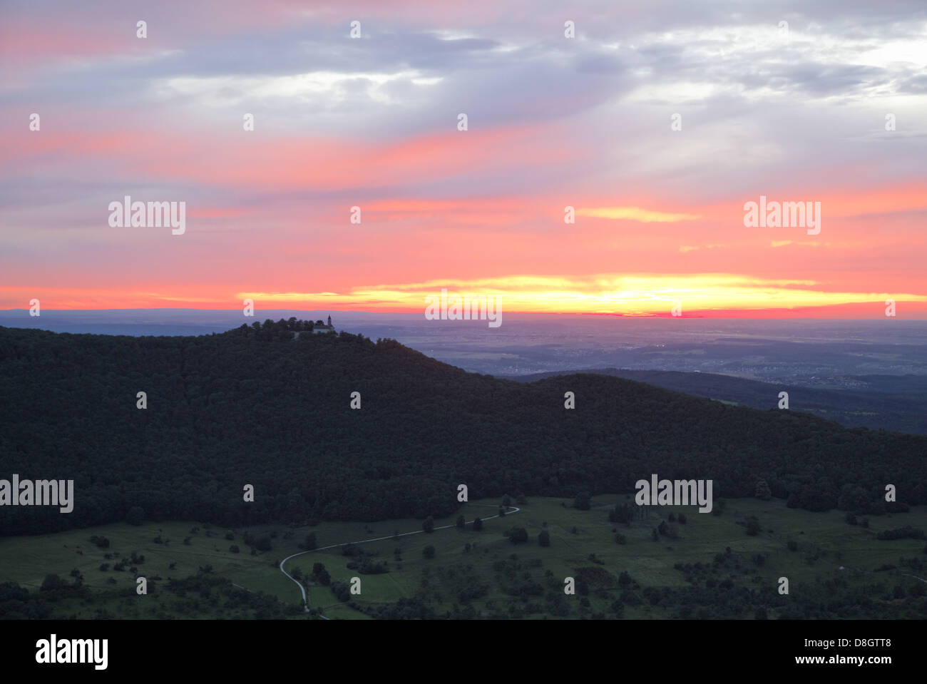 Germany, Baden-Württemberg, Swabian Alb plateau; View from Breitenstein, look at the Teck castle, sunset Stock Photo