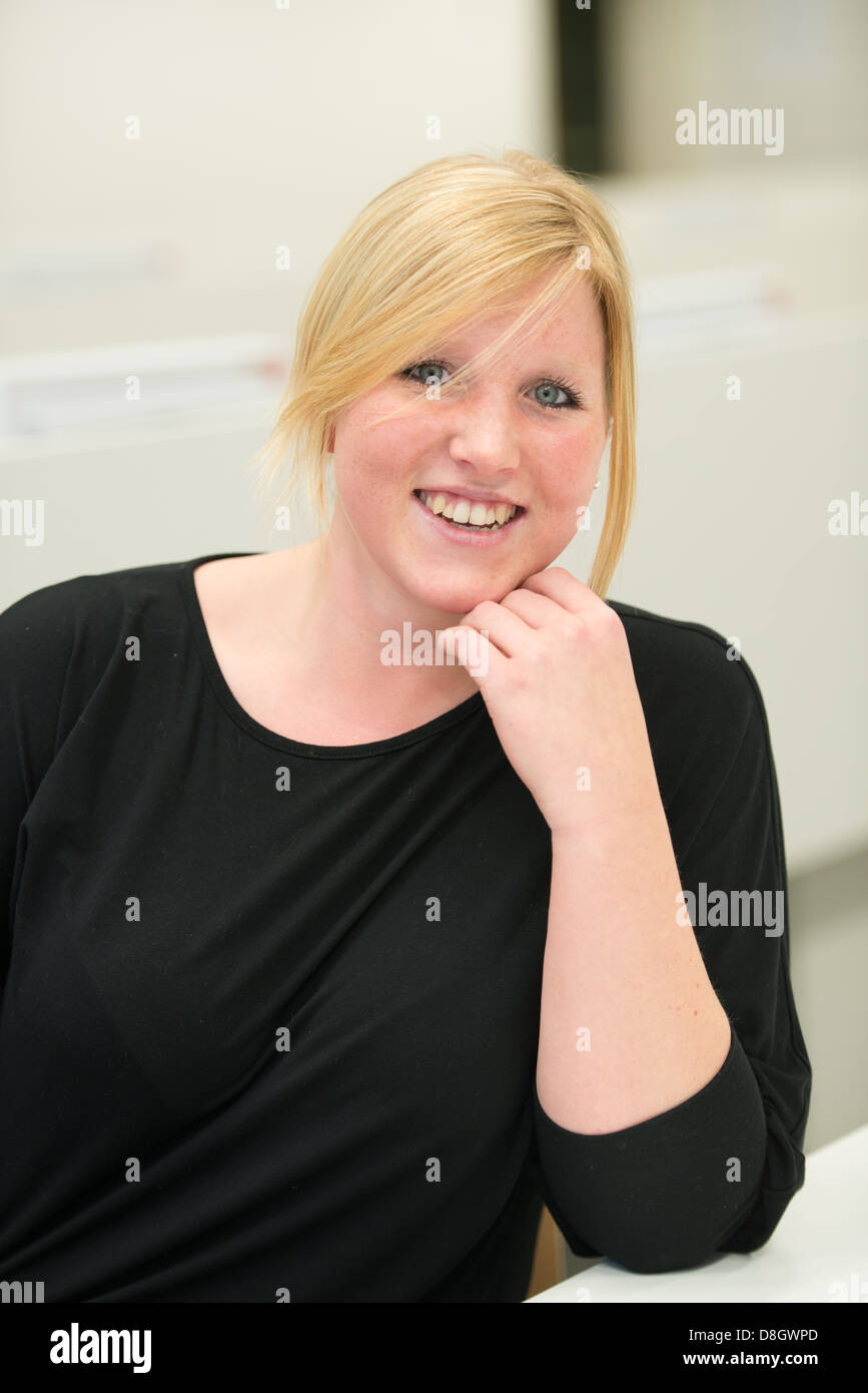 portrait of smiling blond girl Stock Photo - Alamy