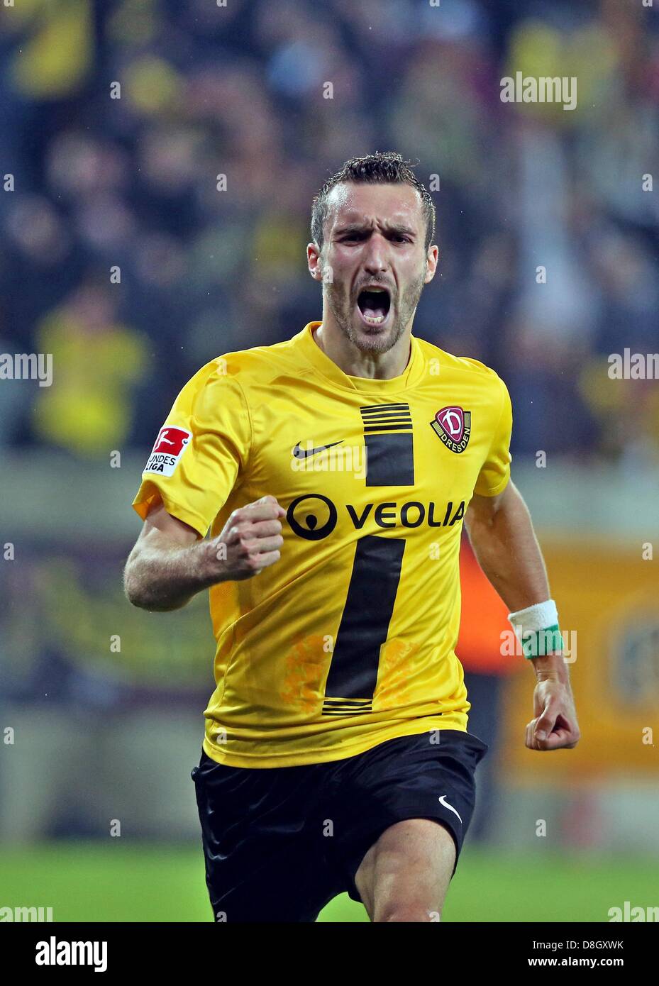 Dresden's Idir Ouali celebrates his 2-0 goal during the Bundesliga 2nd devision relegation second-leg match between Dynamo Dresden and VfL Osnabrueck at gluecksgas-stadion in Dresden, Germany, 28 May 2013. Photo: Jan Woitas Stock Photo