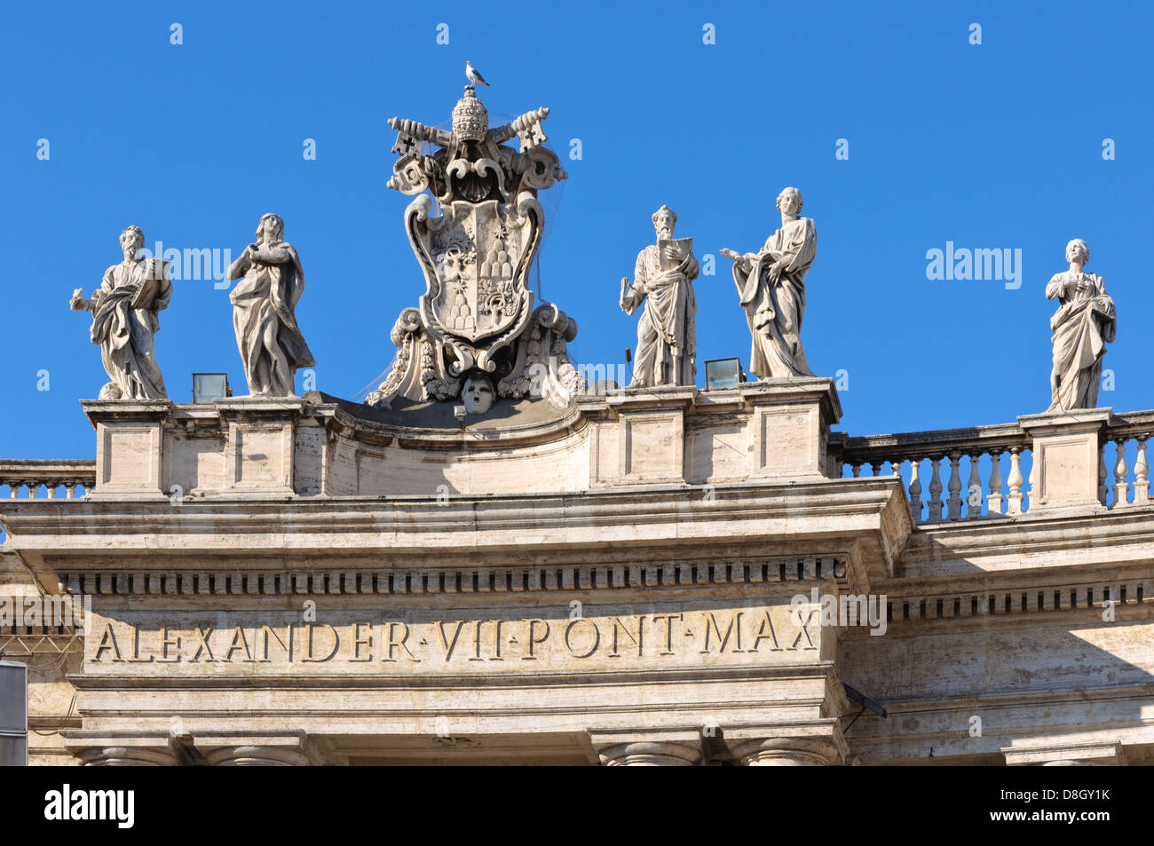 Statues on top of Bernini's colonnades, St. Peters Square, Vatican City, Rome, Italy Stock Photo