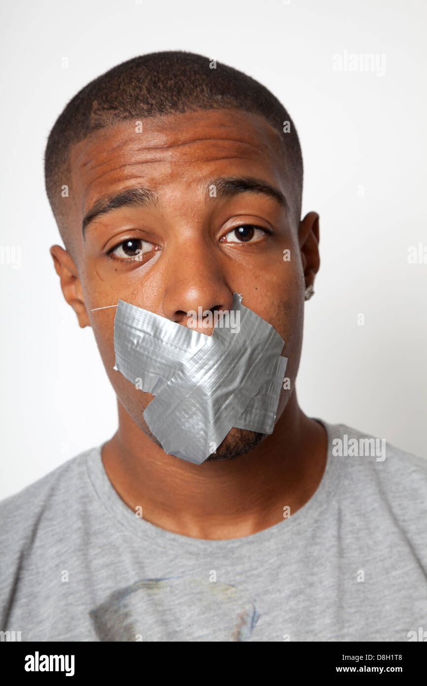 Black male's Mouth gagged Stock Photo - Alamy