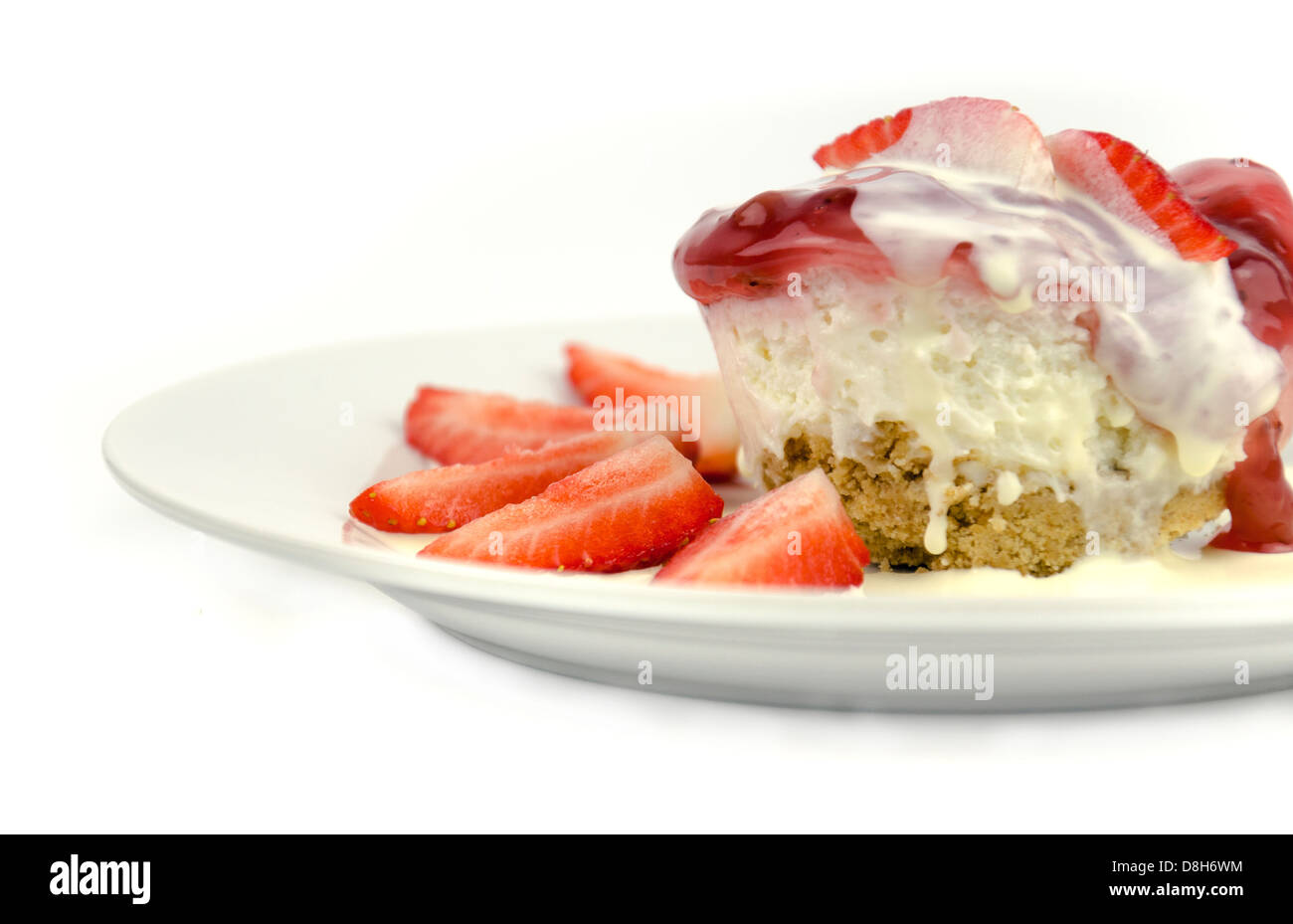 Strawberry cheesecake with fresh strawberries and fresh cream Stock Photo