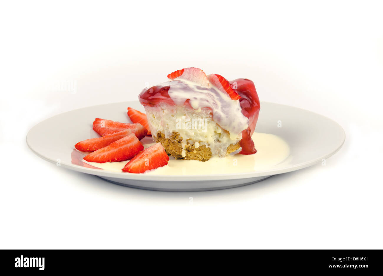 Strawberry cheesecake with fresh strawberries and cream Stock Photo