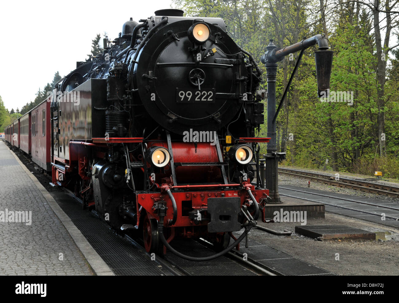 Steam train departs Stock Photo