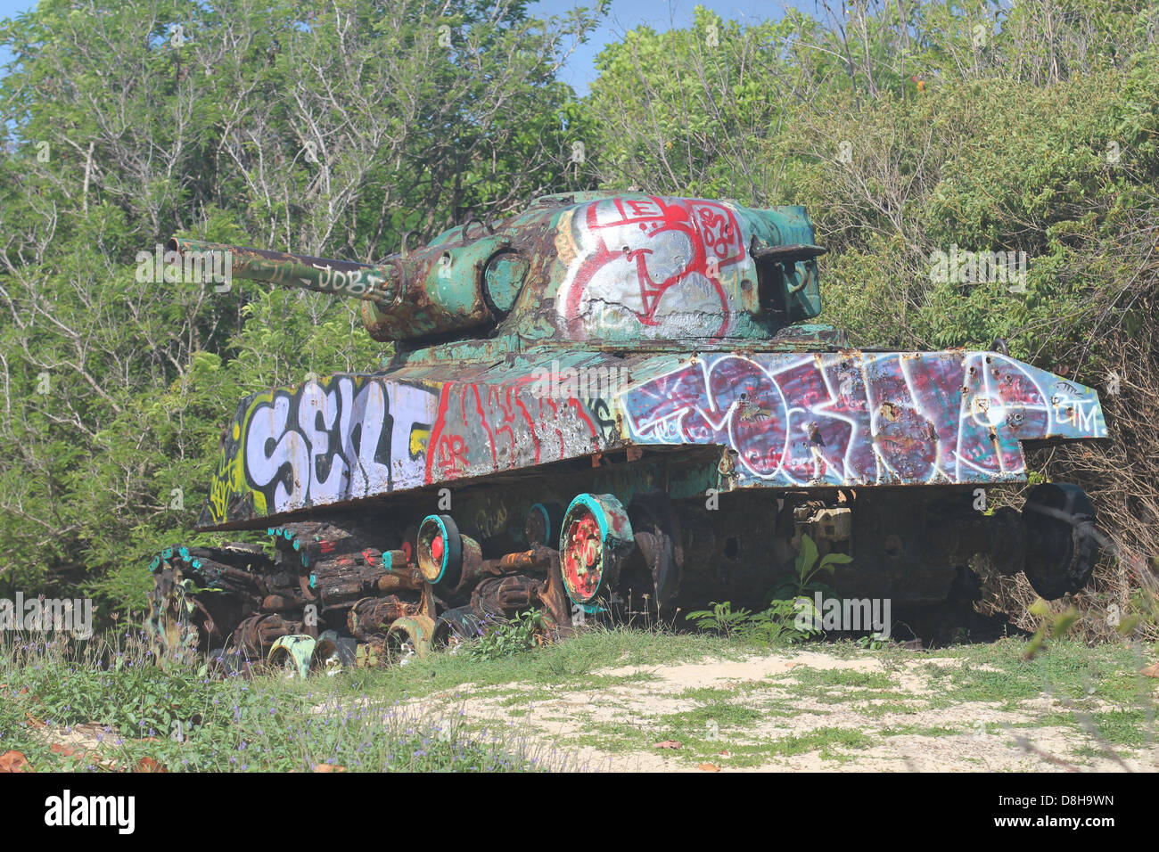 Graffiti painted tank on Flamenco Beach in Puerto Rico Stock Photo