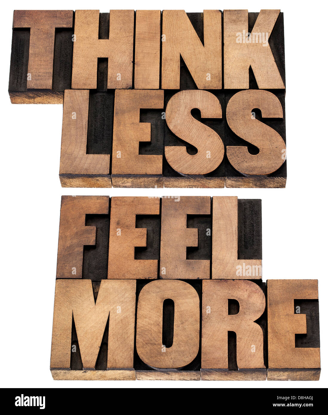 think less, feel more - words of wisdom - isolated tex in vintage letterpress wood type Stock Photo