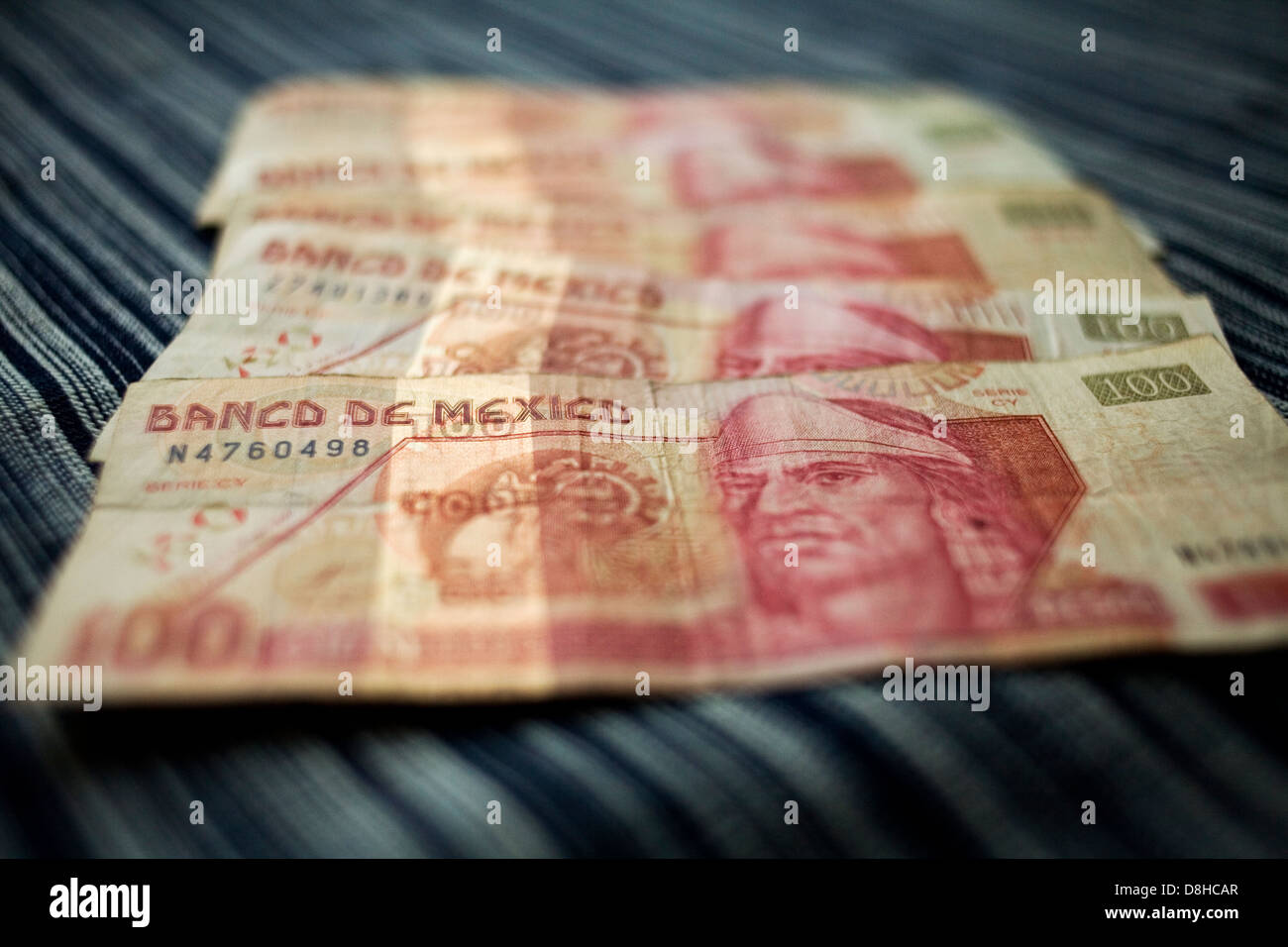 Five 100 Mexican Peso Bank Notes Stock Photo
