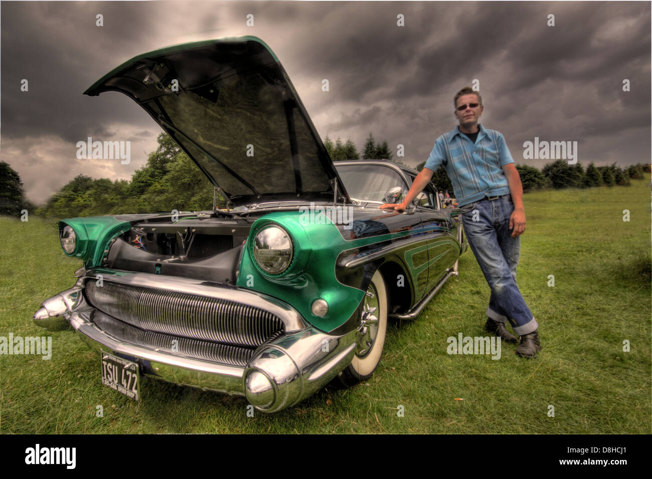 Black & Green 1957 Buick classic car ; Dave Weatherby with his award winning American 1957 classic car Stock Photo
