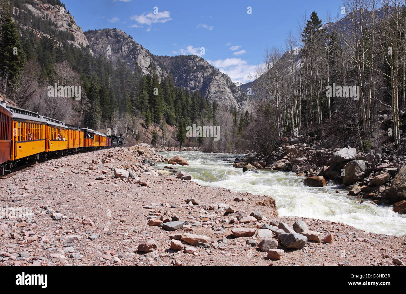 The Durango to Silverton  Locomotive steaming along the Animas River towards Silverton Stock Photo