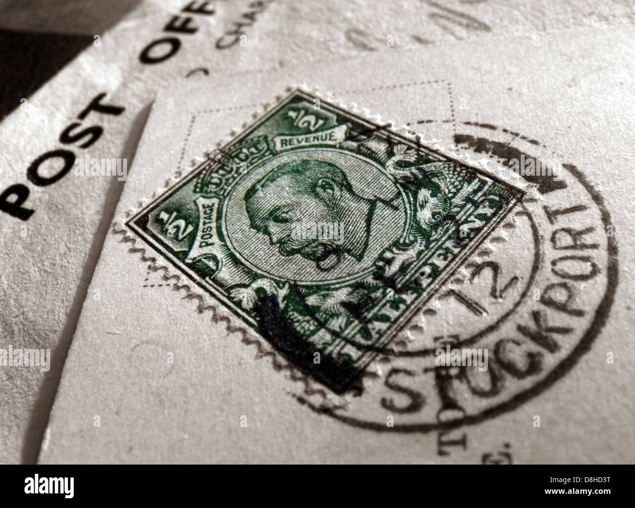 Green Half Penny British Stamp postmarked Stockport Cheshire England UK Stock Photo