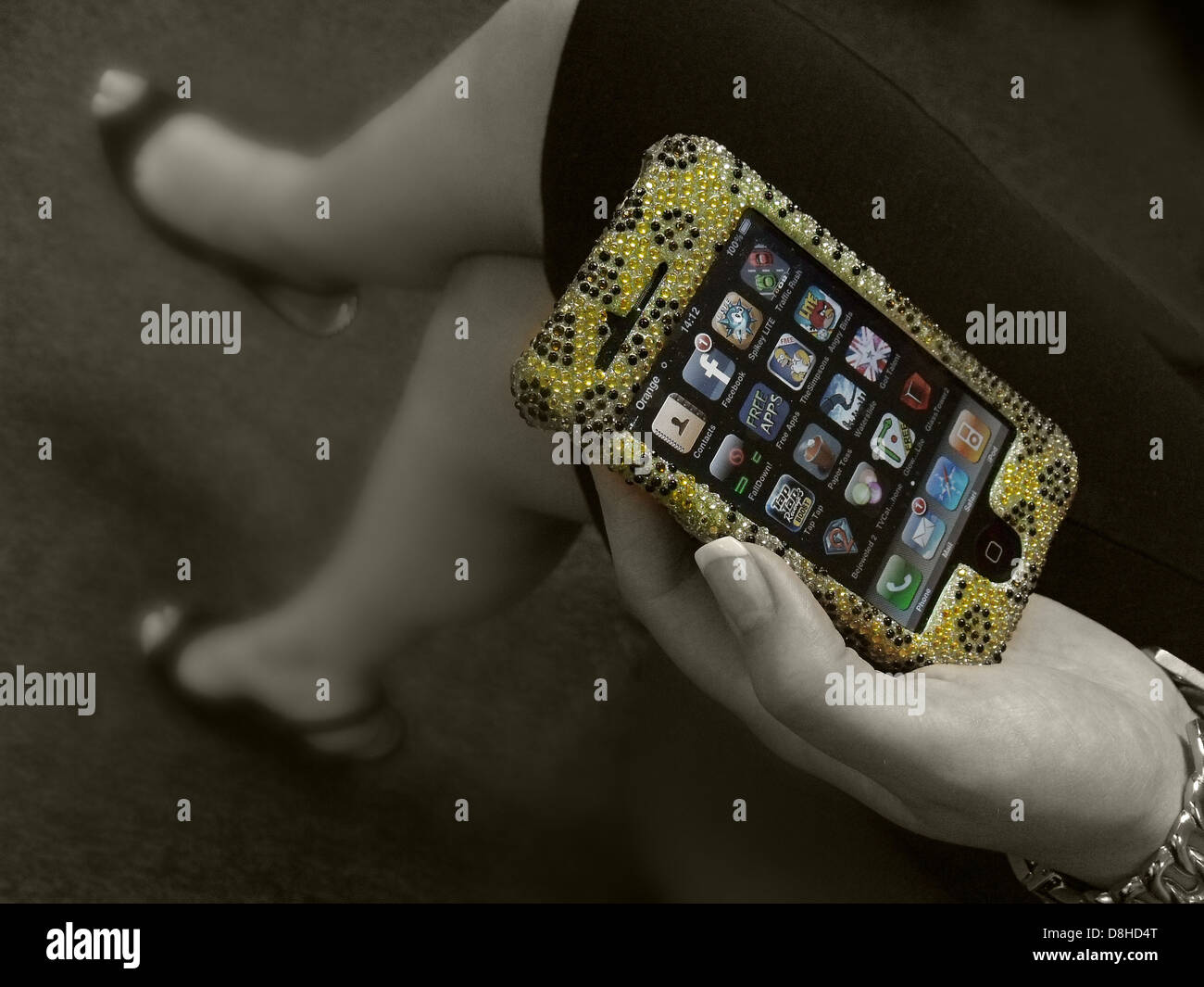 Bling iPhone golden diamond encrusted Stock Photo