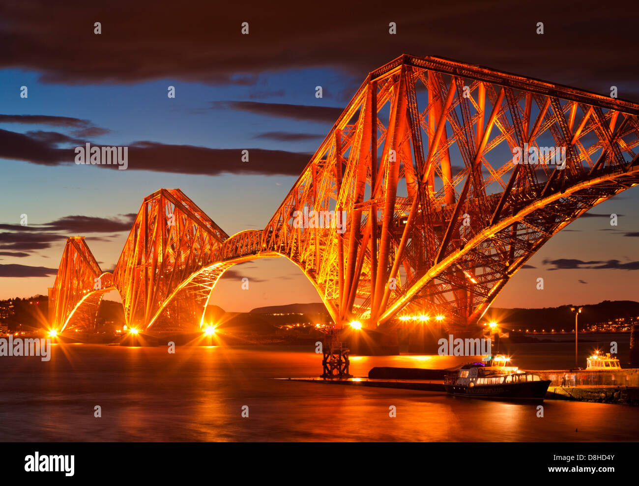 Forth rail bridge illuminated at night South Queensferry Edinburgh Midlothian Scotland UK GB Europe Stock Photo