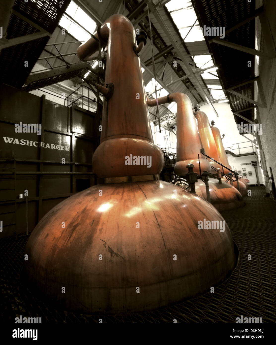 The Tobermory Whisky Distillery copper Still, Tobermory, Isle-of-Mull, Scotland, UK, PA75 6NR Stock Photo