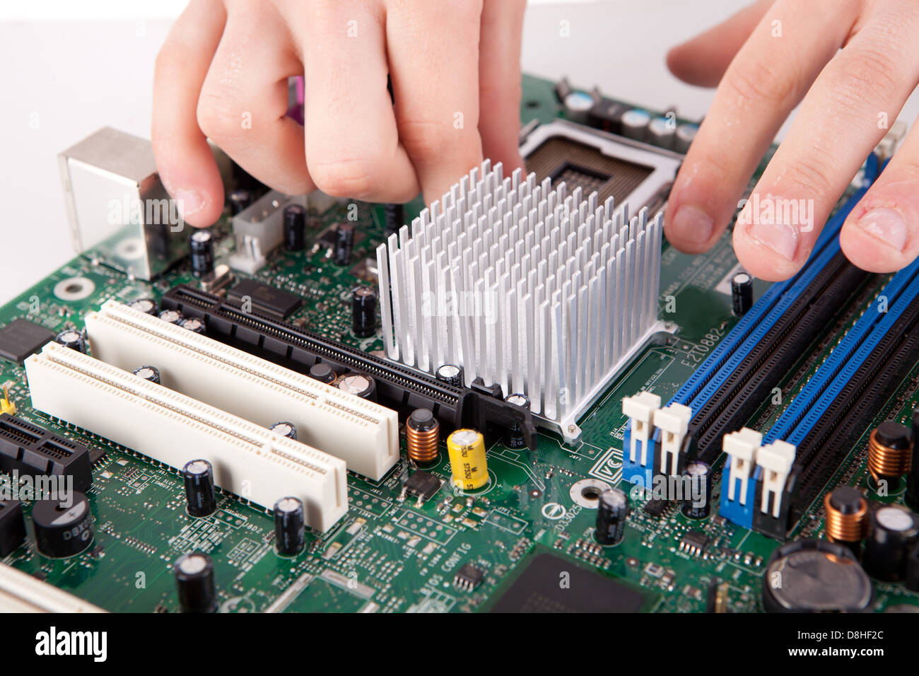 Computer engineer working on an old motherboard Stock Photo - Alamy