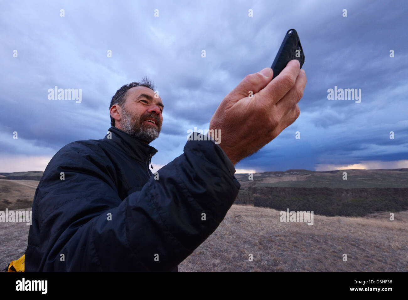Making A Cell Phone Call In The Owyhee Desert Idaho Stock Photo Alamy