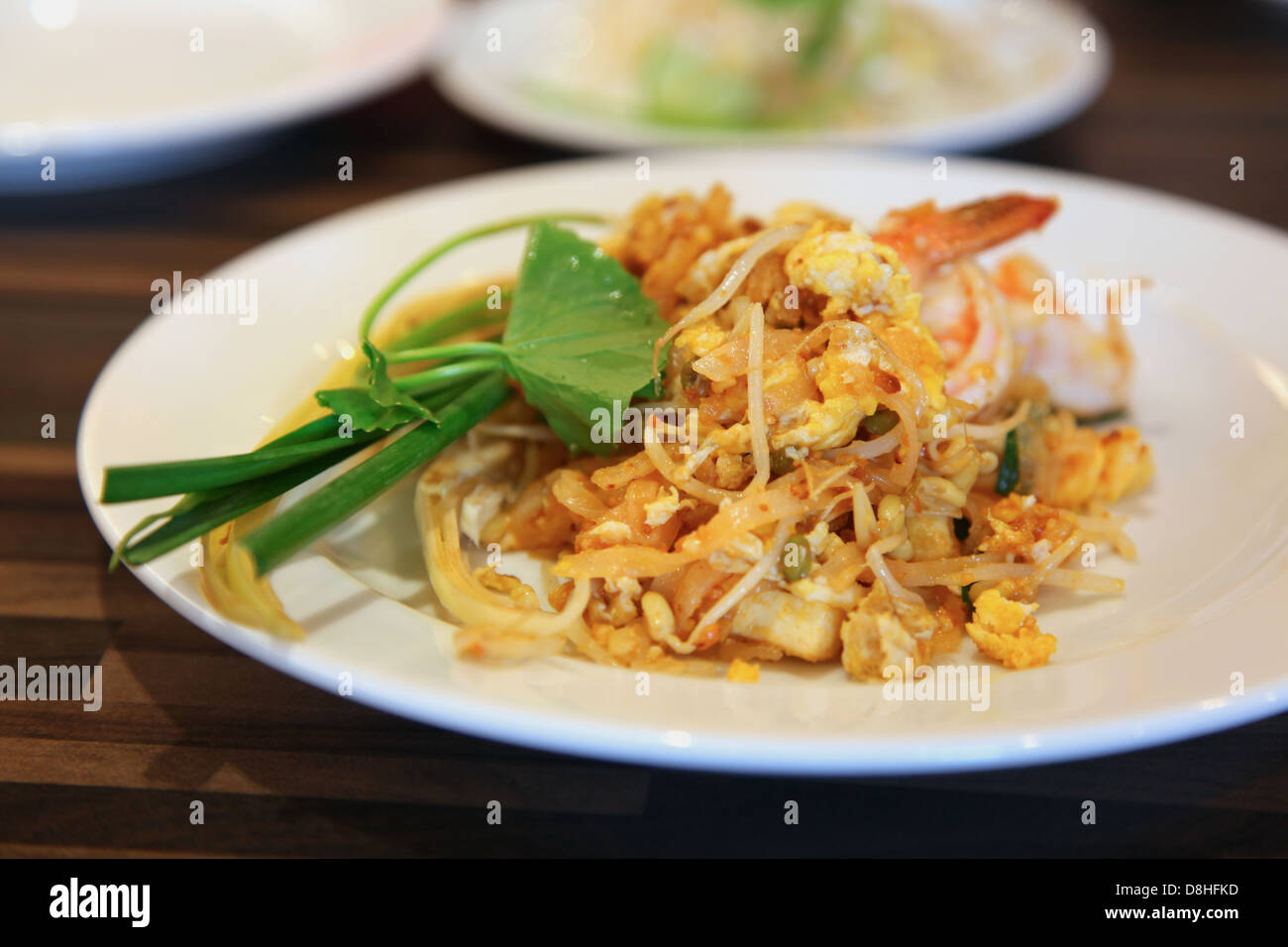 Thai stir-fried noodles with shrimps Stock Photo