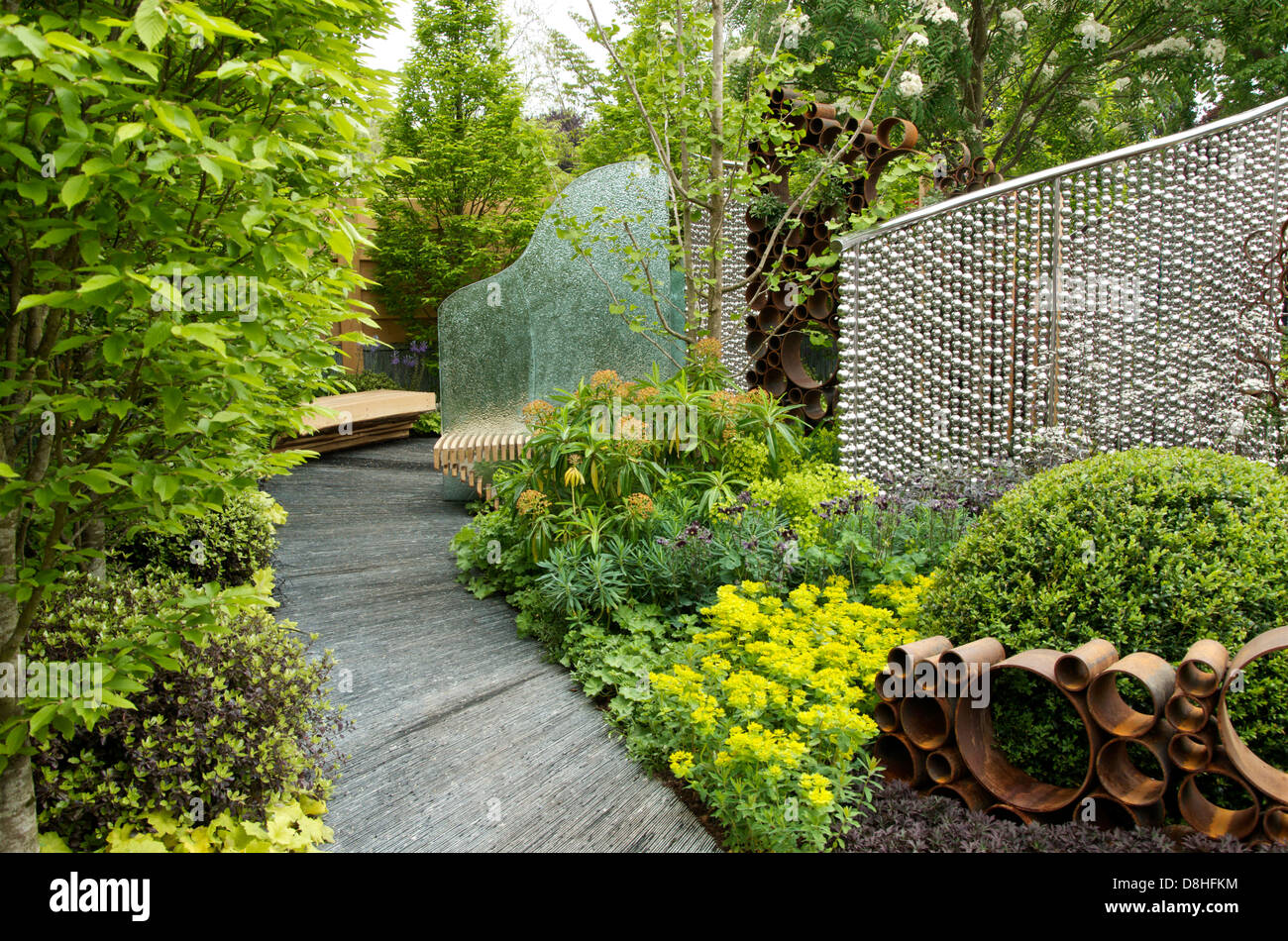 Contrasting planting and screens in The SeeAbility Garden at RHS Chelsea Flower Show 2013. The garden is designed for those with sight impairment. Stock Photo