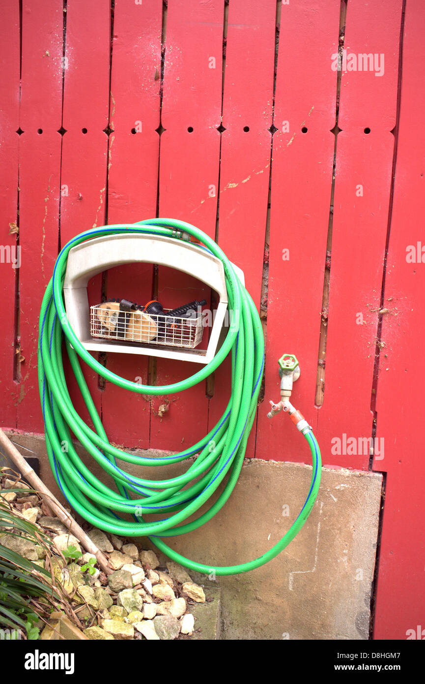 Green garden hose Stock Photo Alamy