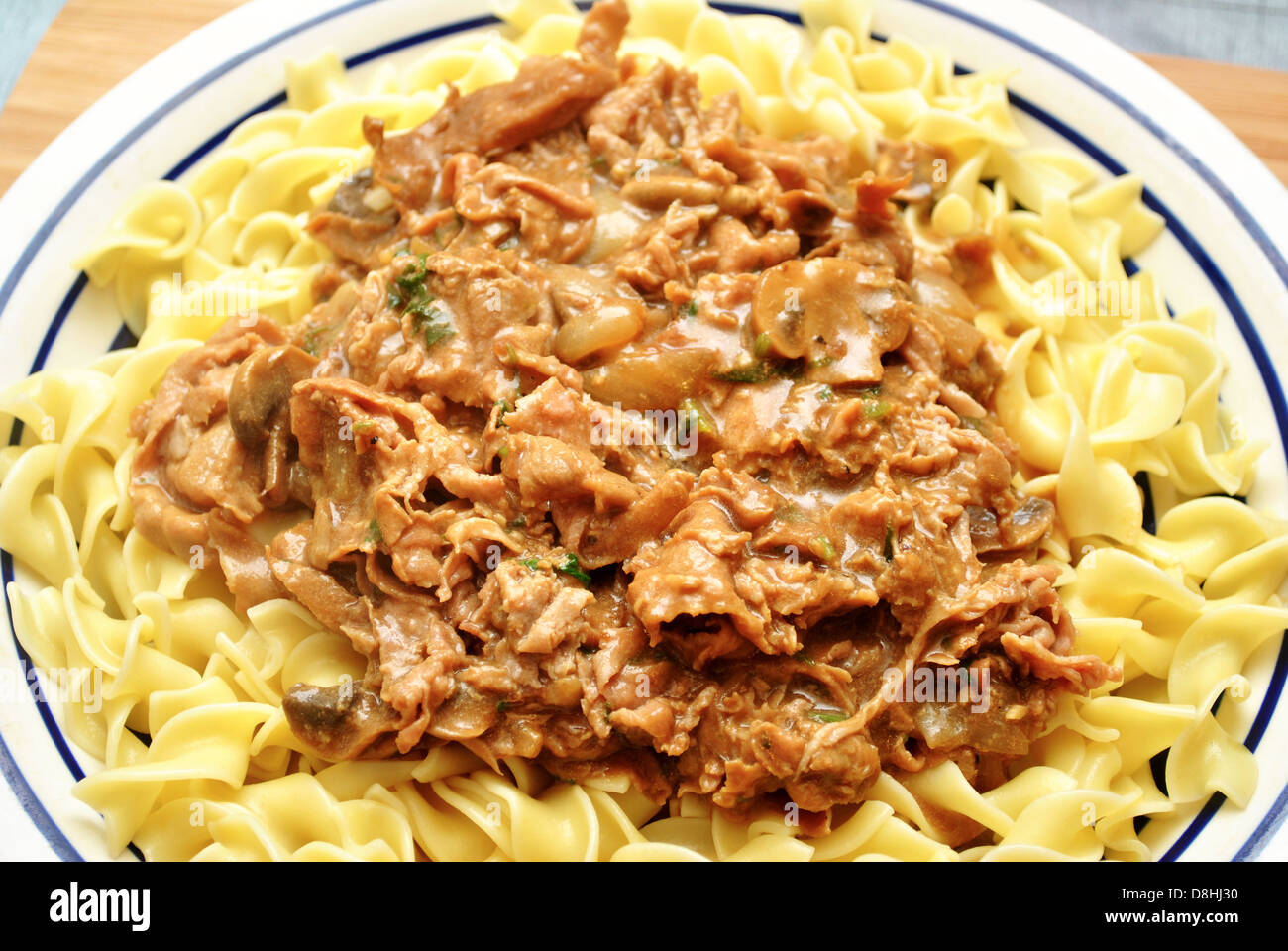 Beef Gravy Over Egg Noodles Stock Photo Alamy