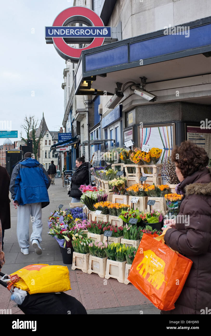 flower stall outside finchley road tube station, london underground