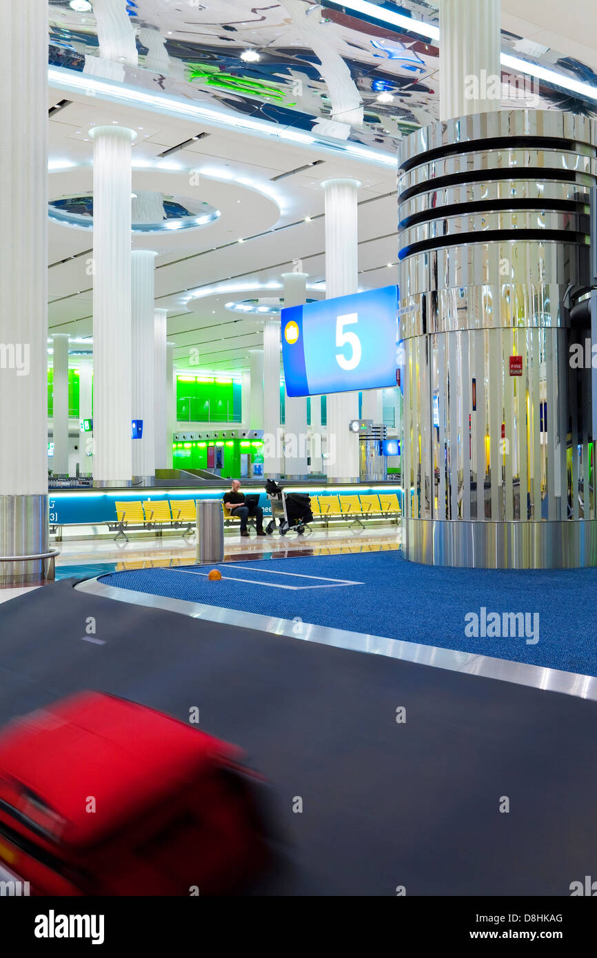 UAE, United Arab Emirates, Dubai, Dubai International Airport, Terminal 3, Baggage Carousel in the Arrivals Hall Stock Photo