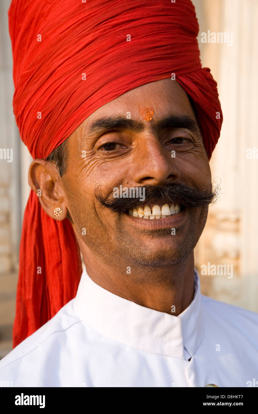 India, Rajasthan, Jaipur, City Palace complex, Palace guard wearing a ...