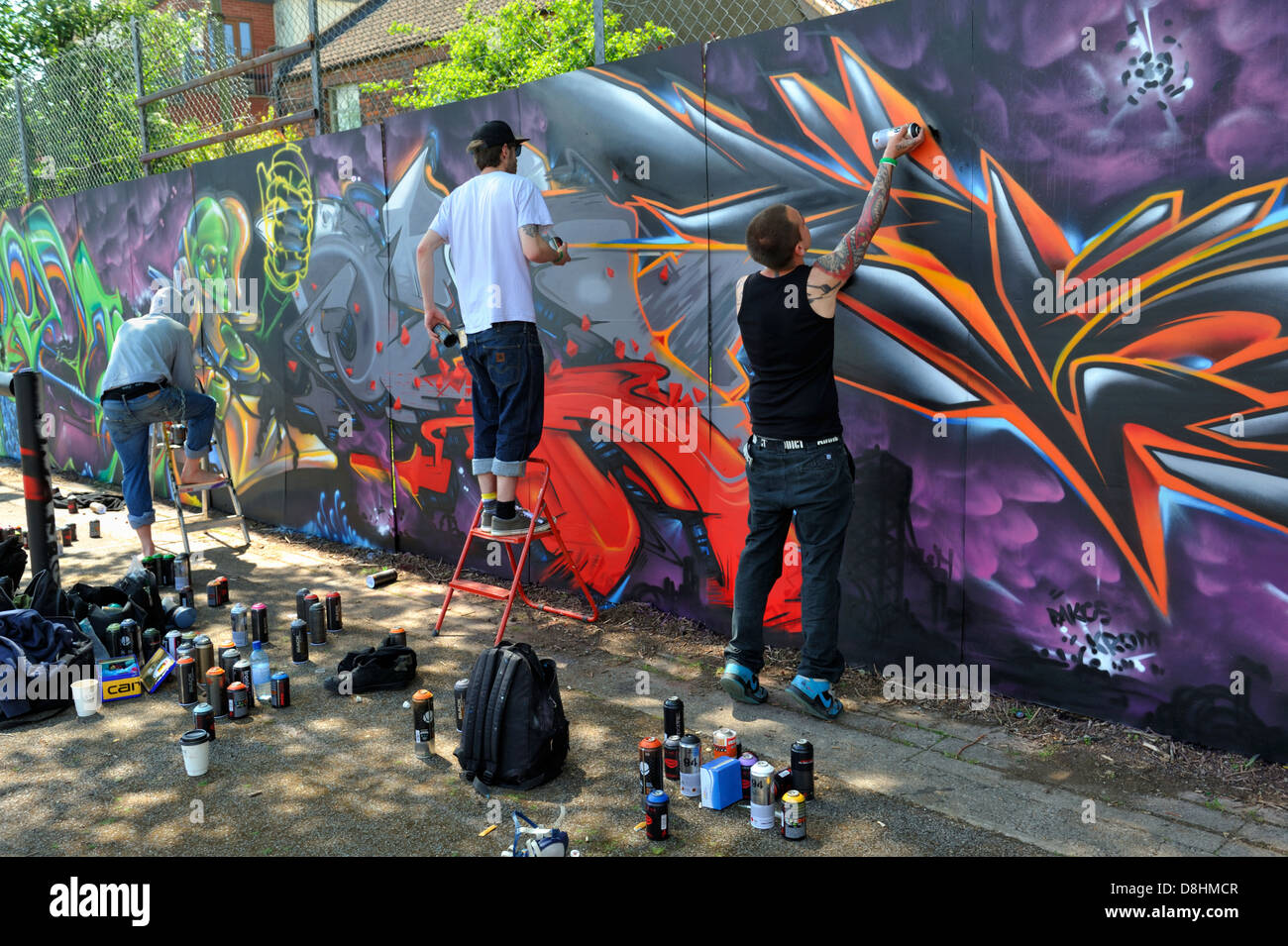 Graffiti artists working at graffiti festival Upfest Bristol 2013 Stock