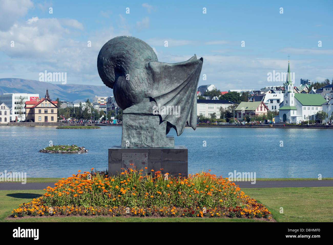 Iceland, Reykjavik, Lake Tjornin, statue by Einar Jonsson Stock Photo