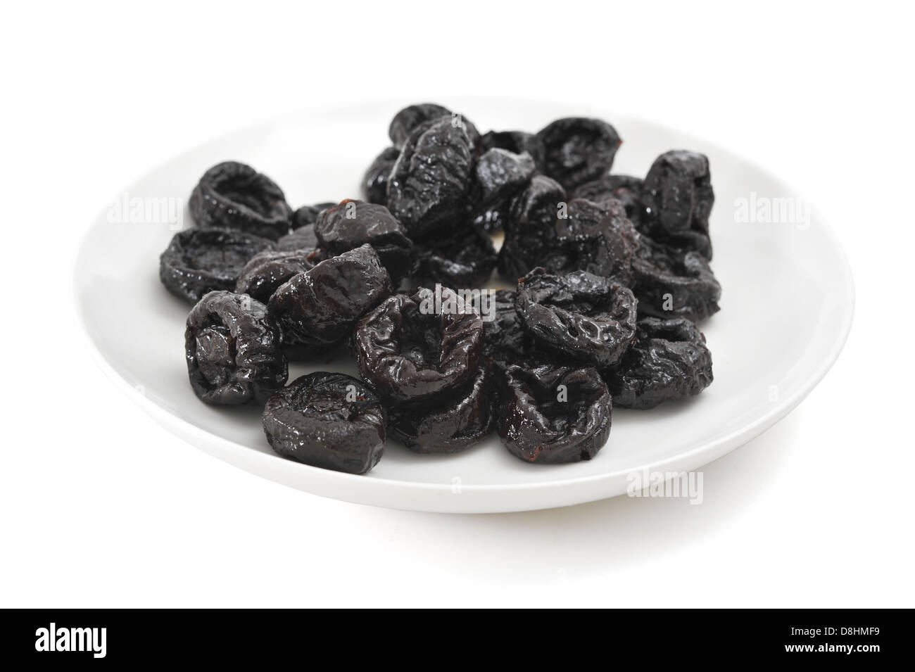 Prunes with clipping path Stock Photo
