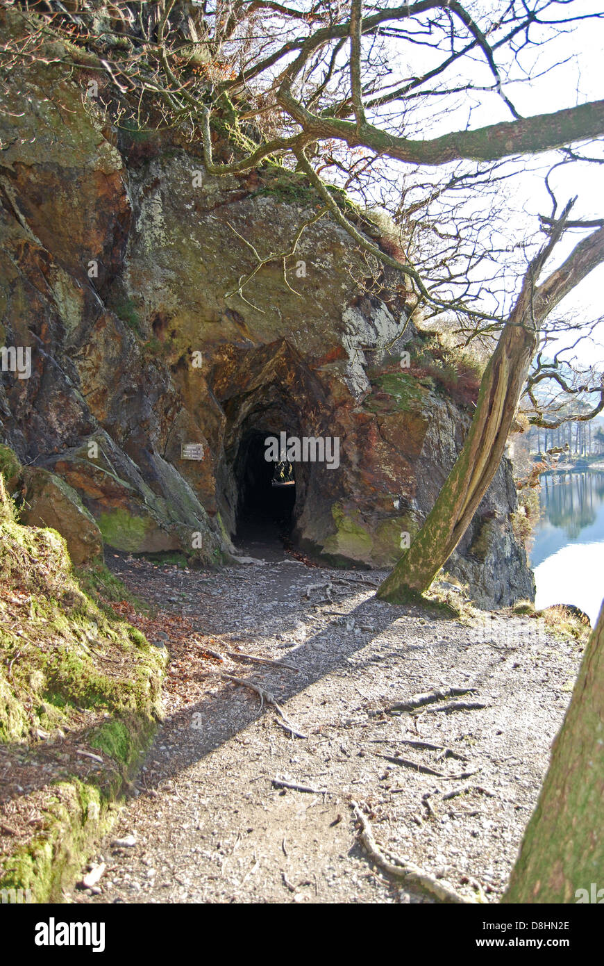 Lakeside path goes through a tunnel, Buttermere, The Lake District, Cumbria.  UK. Stock Photo