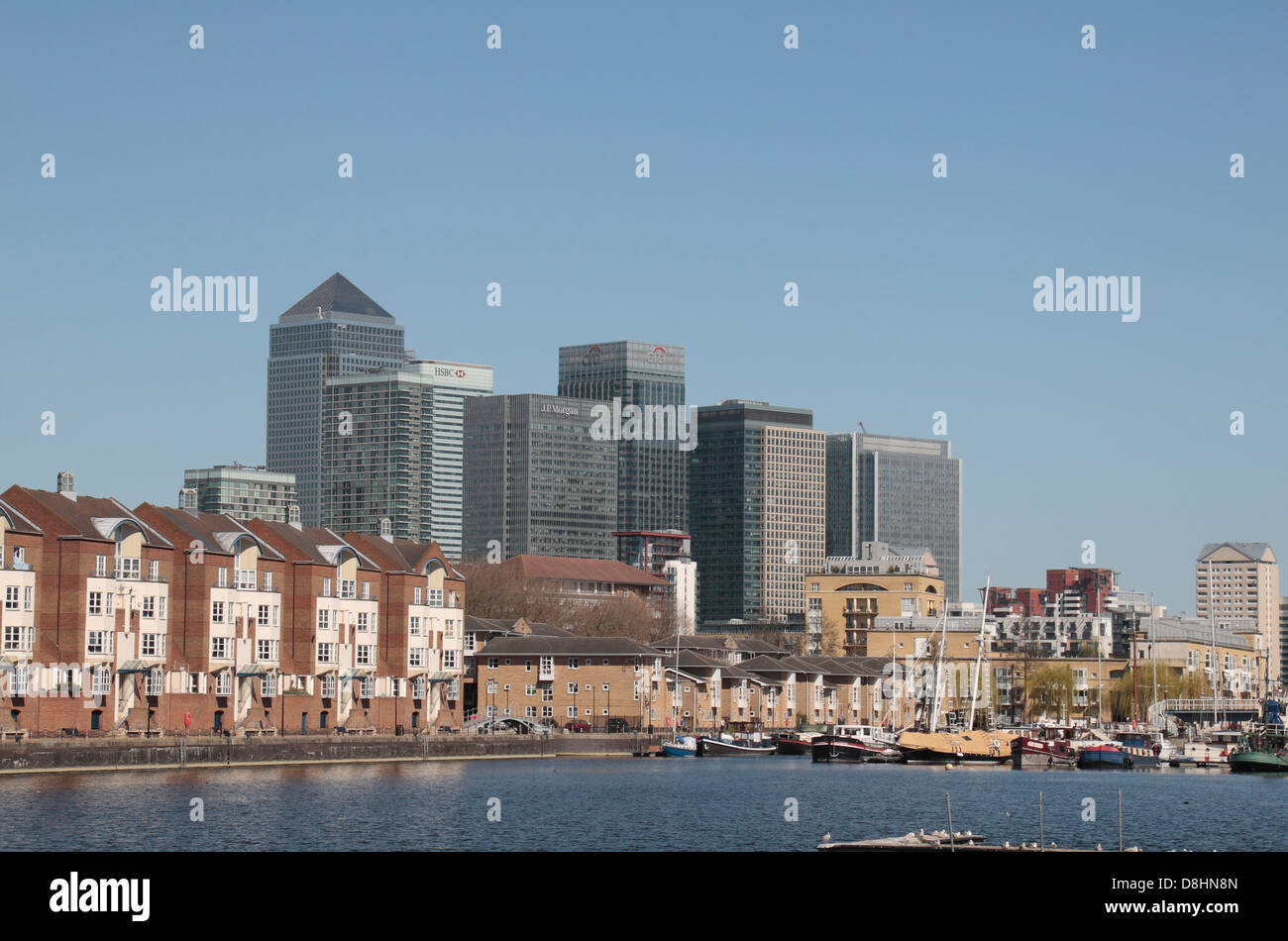 View across Greenland Dock with the Canary Wharf development in the distance, Bermondsey London, SE16, UK. Stock Photo