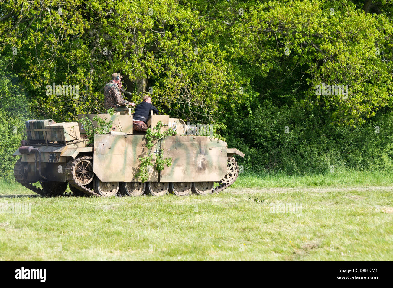 Overlord, D-Day re-enactment at Denmead 2013. A German Panzer tank moves into position. Stock Photo