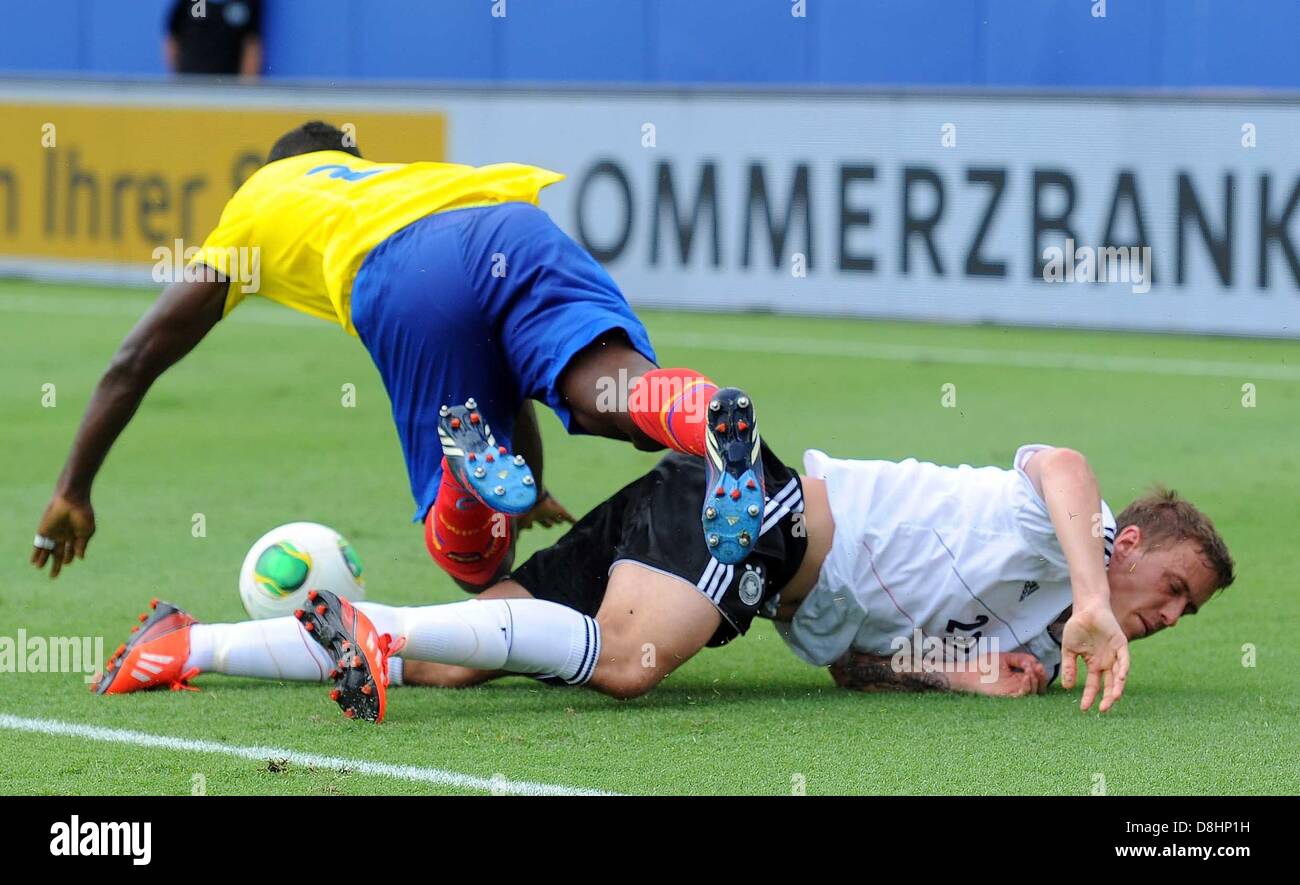 Max Kruse (r) of Germany and Gabriel Achilier of Ecuador vie for the ball during the international friendly soccer match between Germany and Ecuador at FAU stadium in Boca Raton, Florida, USA, 29 May 2013. Photo: Thomas Eisenhuth/dpa +++(c) dpa - Bildfunk+++ Stock Photo